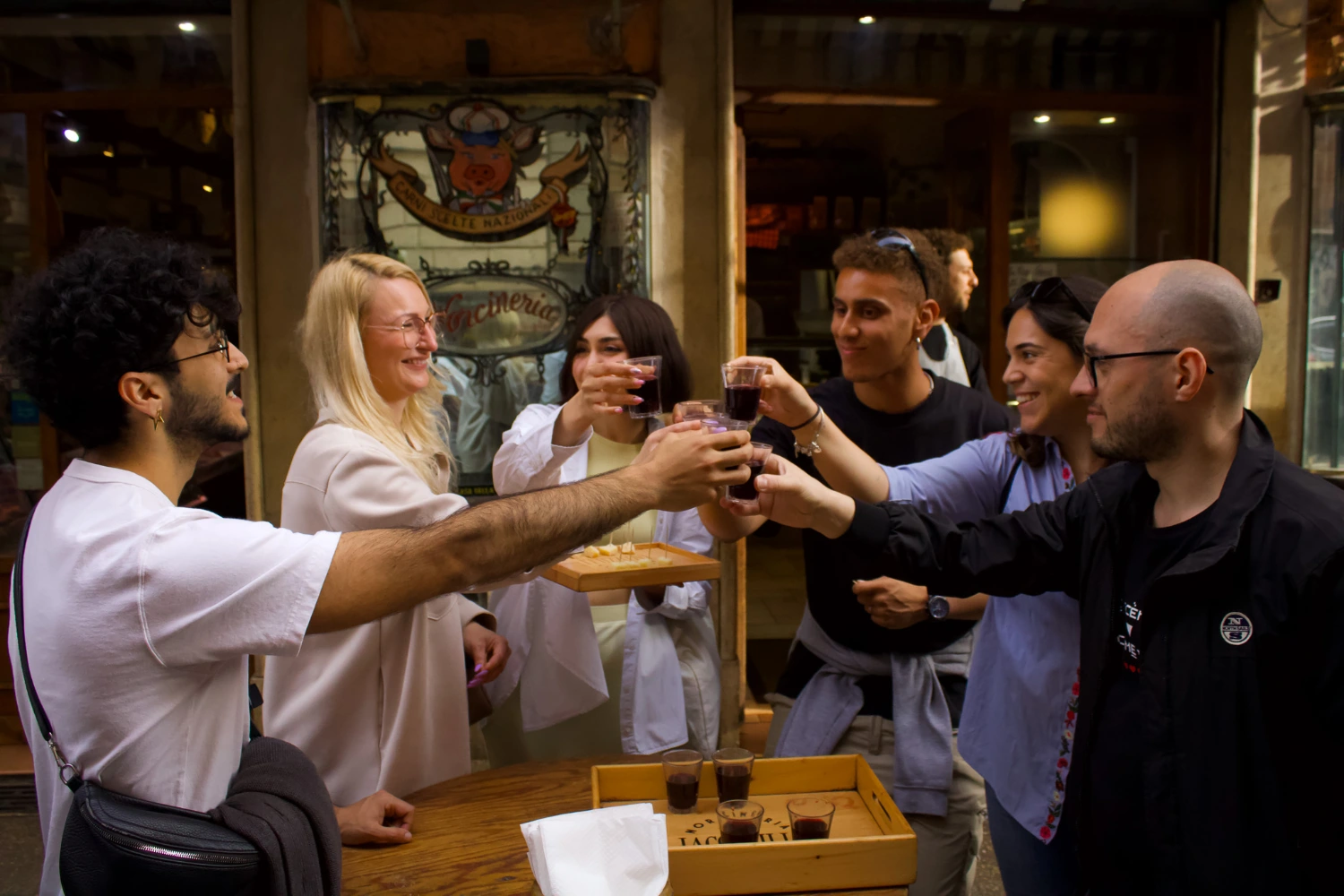 carpe-diem-tours-rome-food-tour-group-wine-toast-norcineria-exterior